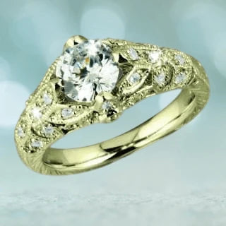 Floral Vine Ring Gold featuring a sterling silver base with gold plating, adorned with intricate floral vine patterns and sparkling gemstones, designed for women.
