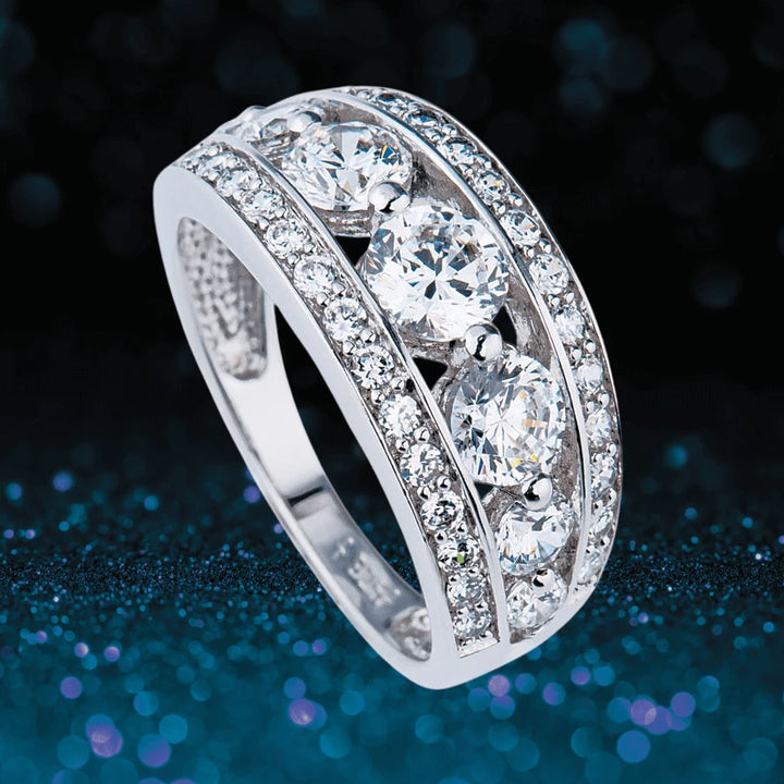 Martini Ring in sterling silver featuring a triple row of sparkling round-cut clear stones, designed for women seeking elegant and timeless jewelry.