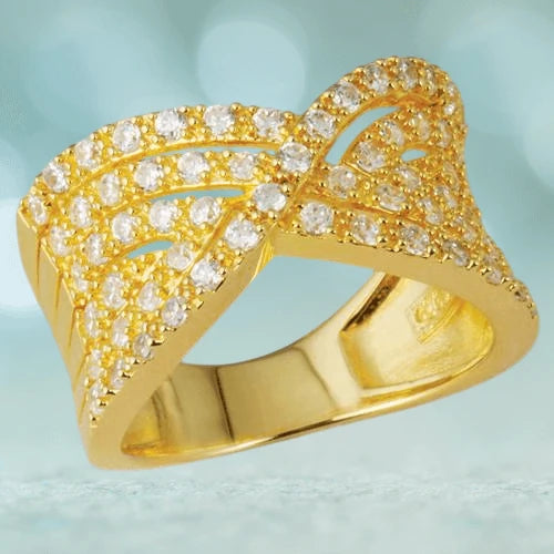 Close-up of the Paris Ring Gold for females, featuring sterling silver material with a gold plating and an intricate design studded with sparkling clear stones, showcasing elegant jewelry craftsmanship.