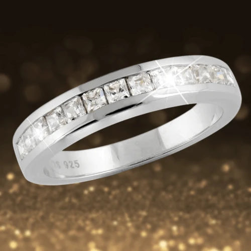 Elegant sterling silver Manhattan Stacker E ring for female featuring a row of sparkling square-cut stones in a sleek, polished band design.