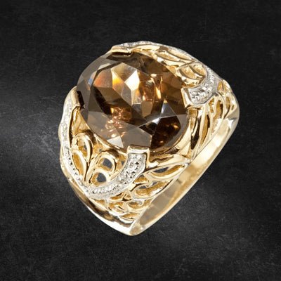Smokey Topaz Ring featuring a large faceted smokey topaz gemstone set in an intricately designed sterling silver band with gold plating, crafted for women’s jewelry.