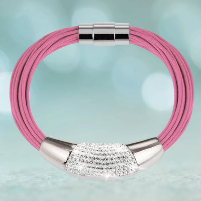 Cristal Pink Bracelet featuring a feminine pink multi-strand stainless steel band with a sleek silver-toned clasp and a sparkling rhinestone-accented centerpiece.