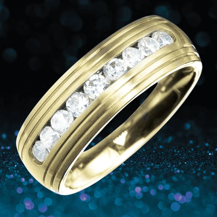 Couture Band Gold Ring featuring a row of sparkling stones set in gold-plated stainless steel, designed as a unisex jewelry piece perfect for any occasion.