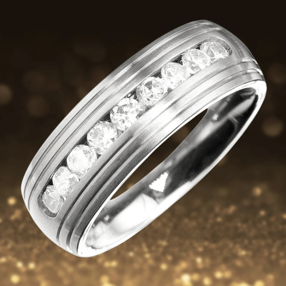 Couture Band Steel Ring featuring a unisex stainless steel band with a row of sparkling clear stones set in the center, offering a modern and elegant jewelry design.
