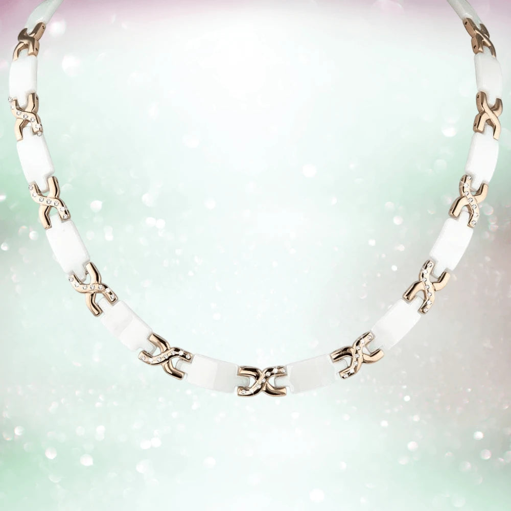 Ceramic Deluxe Necklace featuring white ceramic links with rose gold plated stainless steel accents, an elegant jewelry piece designed for women.
