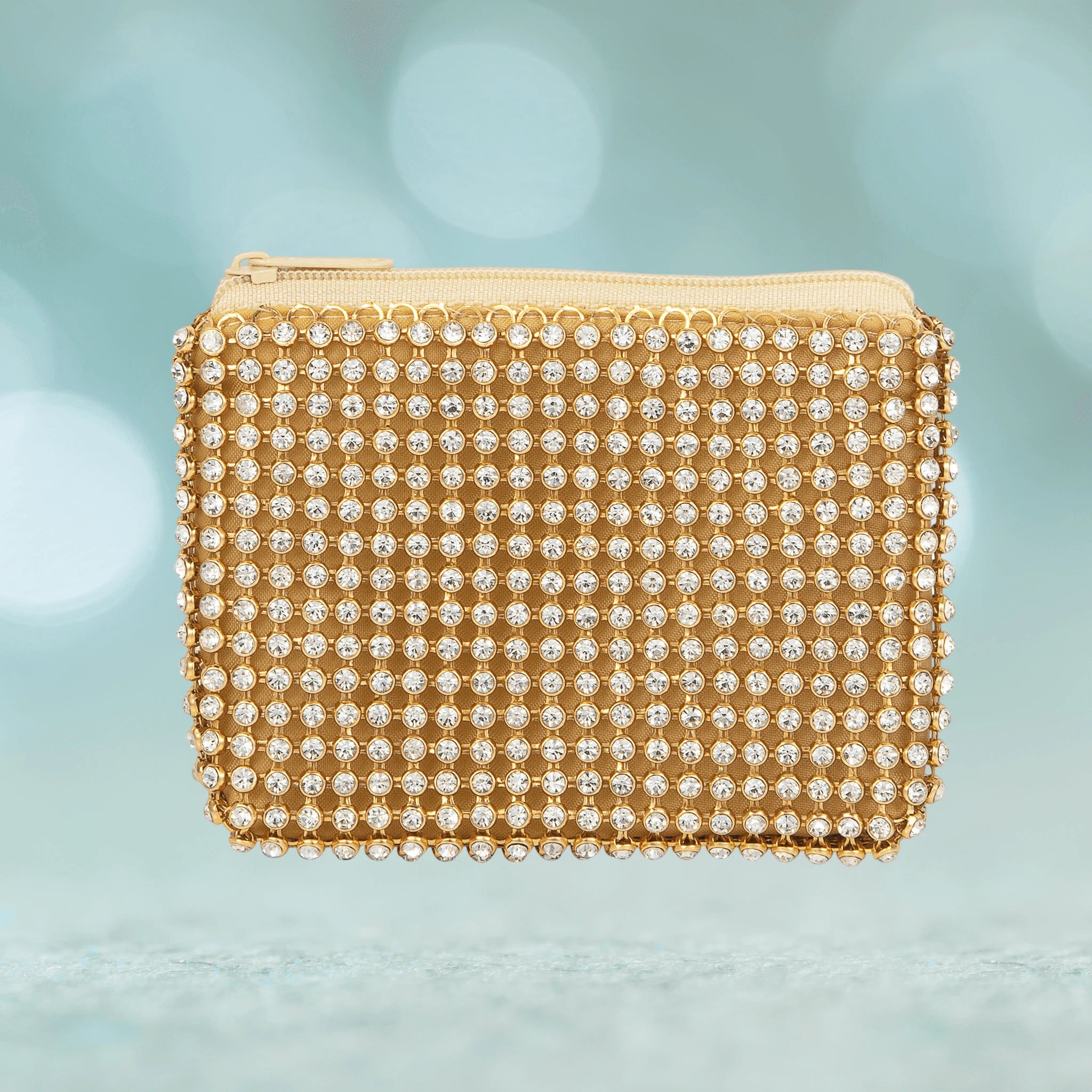 Gold Ruffle Coin Wallet featuring a sparkling rhinestone design with gold ruffle detailing, perfect for women seeking an elegant and stylish coin purse.