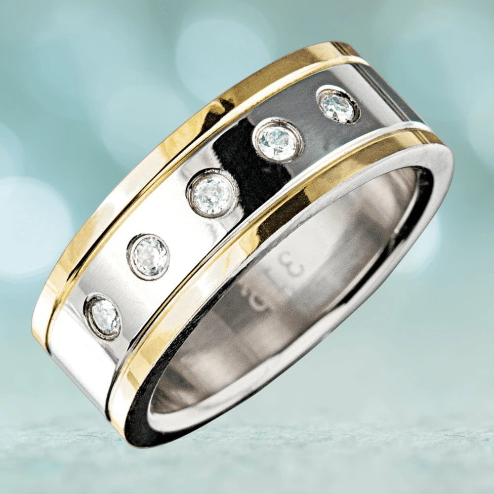 Manhattan Men's Ring featuring a two-tone stainless steel band with gold plating and five inset clear gemstones, designed for a sophisticated male jewelry collection.