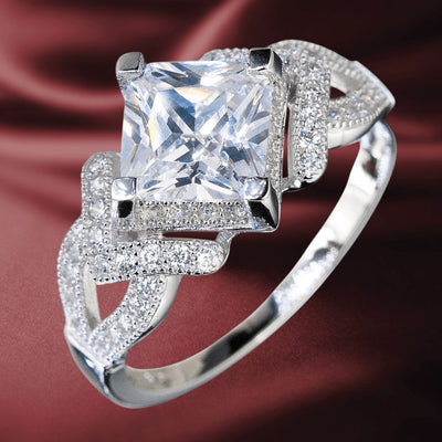 Palermo Rhodium Ring featuring a large square-cut center stone surrounded by intricate sterling silver detailing and rhodium plating, designed for women’s jewelry collections.