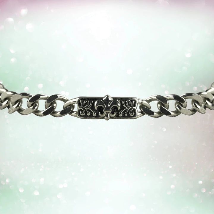 Fiorino Steel Bracelet featuring a stainless steel chain with a detailed central plate engraved with a fleur-de-lis design, elegant men's jewelry accessory.