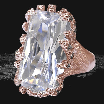 Wild Thorn Rose Gold Ring featuring a large rectangular clear gemstone set in intricate sterling silver with rose gold plating, designed for female jewelry enthusiasts.
