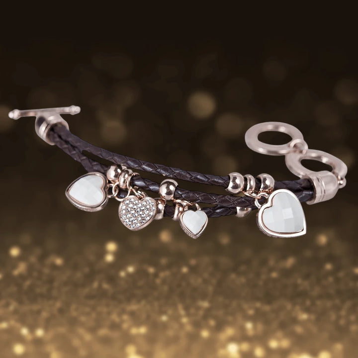 Silhouette Brown Leather Bracelet featuring rose gold accents and heart-shaped charms, designed for women seeking elegant leather jewelry with a delicate touch.