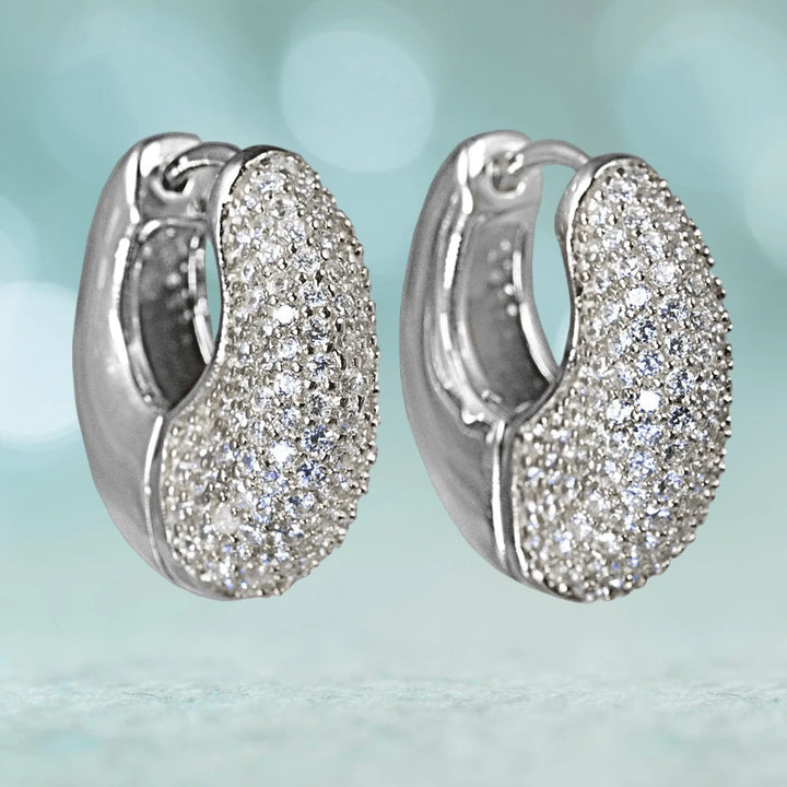 Starfish Silver Earrings crafted in sterling silver with rhodium plating, featuring sparkling pavé details designed for women’s jewelry collections.
