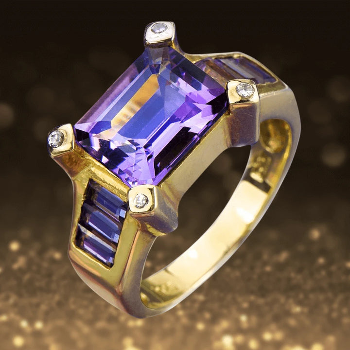 Cleopatra Amethyst Ring featuring a large rectangular amethyst gemstone set in sterling silver with gold plating, accented by small sparkling stones, designed for women’s jewelry.