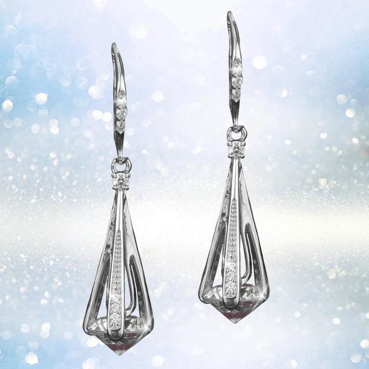 Elegant Cylinda Rhodium Earrings crafted in sterling silver with rhodium plating, featuring a modern geometric design and sparkling accents for women’s jewelry.
