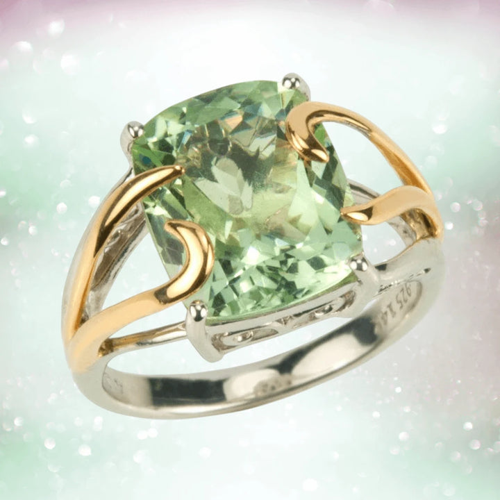 Maxims Amethyst Ring featuring a two-tone sterling silver band with an elegant green amethyst center stone, designed for women’s jewelry collections.