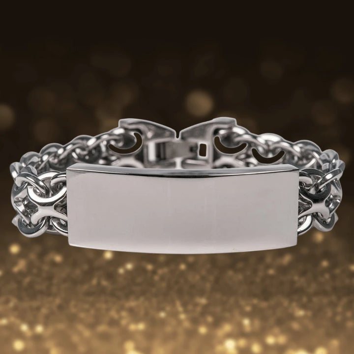 Bravado Steel Bracelet featuring a polished stainless steel plate and an intricately linked chain design, crafted for a sophisticated male jewelry collection.