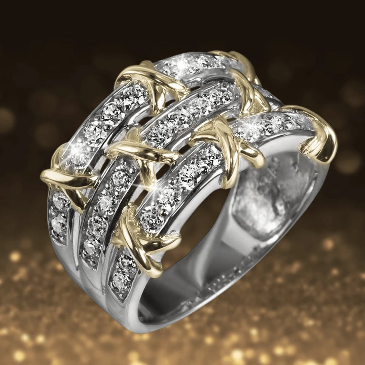 Elegant Sorrento Ring for female, crafted in sterling silver with two-tone plating, featuring a sparkling design of intertwined bands adorned with clear stones.
