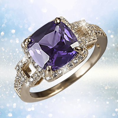 Radiant Orchid Ring featuring a sterling silver band with gold plating, showcasing a large radiant-cut purple gemstone surrounded by sparkling accent stones in an elegant design for women.