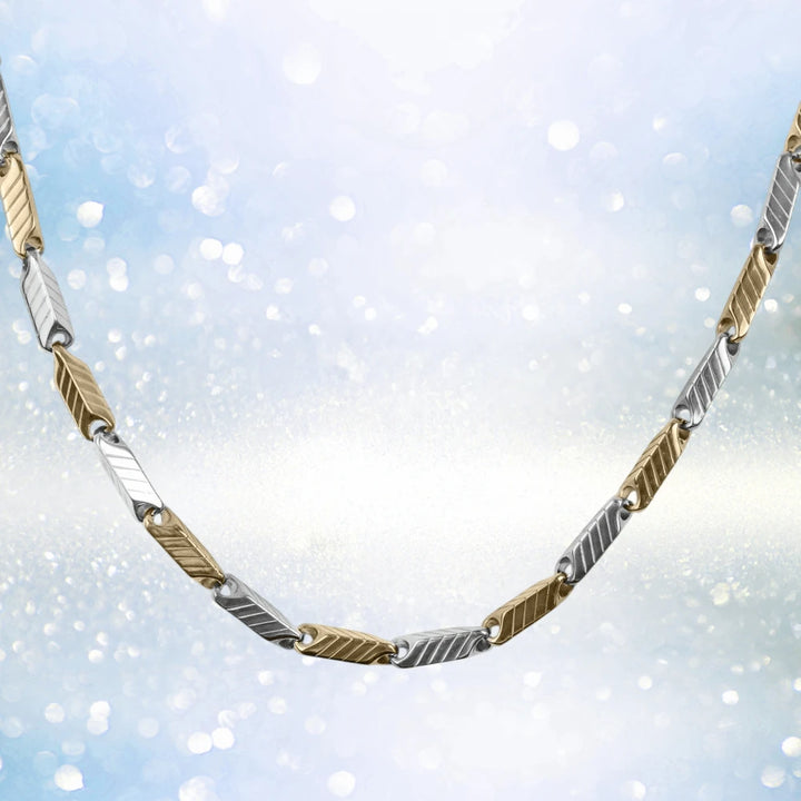 Chevron Steel Necklace featuring two-tone stainless steel links with a sleek chevron pattern, designed for a modern male jewelry collection.