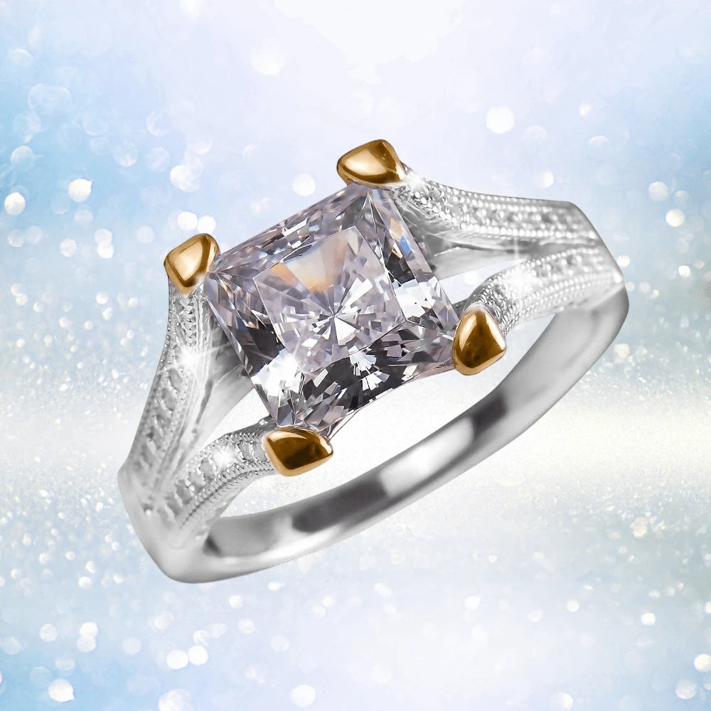 Princessa Ring featuring a two-tone sterling silver band with a square-cut clear stone, elegantly designed for women’s jewelry collections.