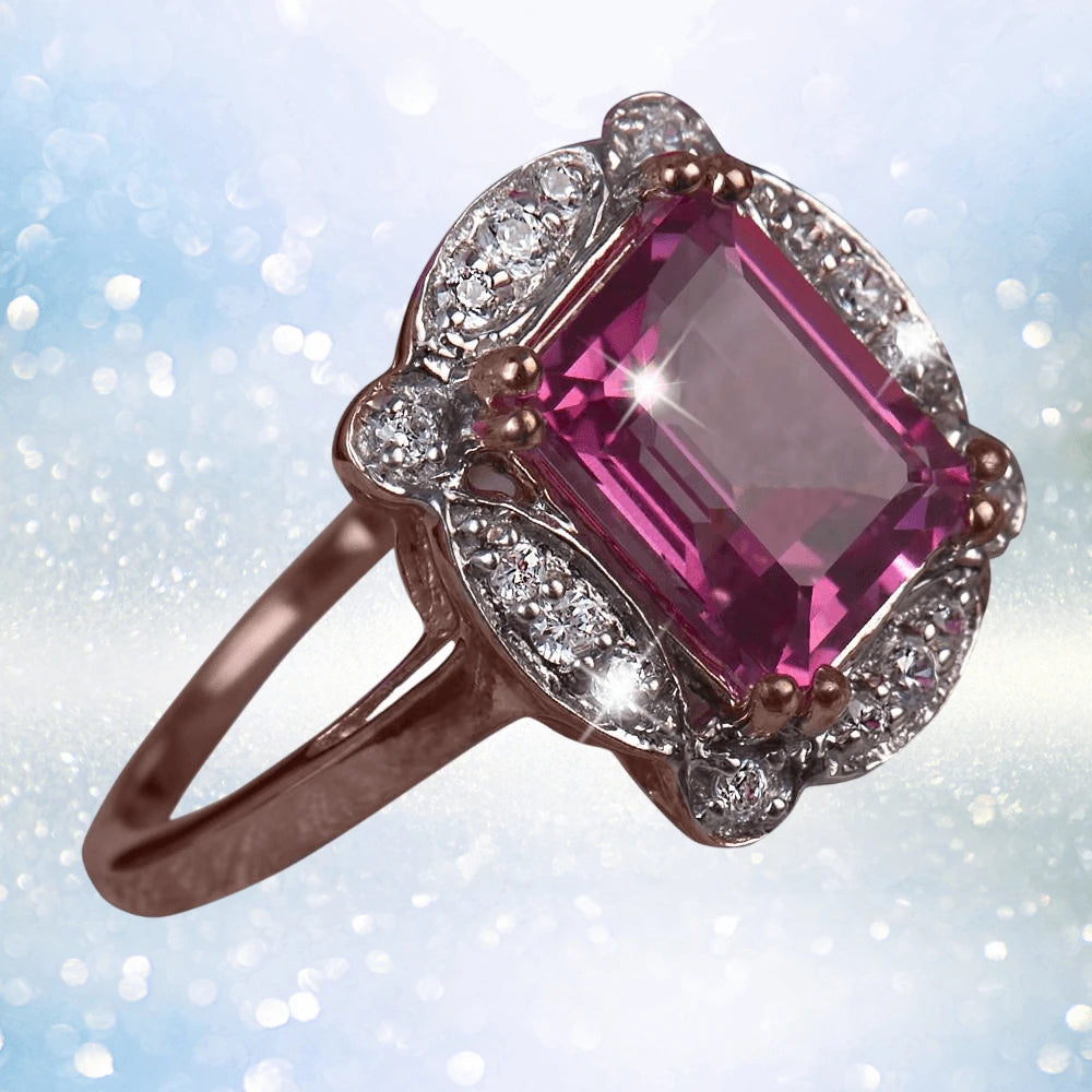 Lille Tourmaline Ring featuring a square pink tourmaline center stone set in sterling silver with rose gold plating and surrounded by sparkling clear stones, designed for women.