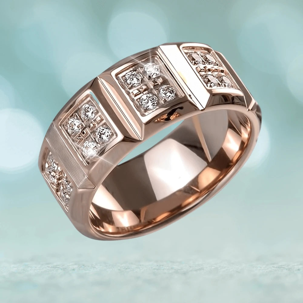Luxor Men's Ring crafted from sterling silver with rose gold plating, featuring a bold segmented design adorned with sparkling stones for a sophisticated masculine look.