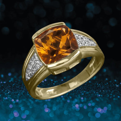 Madeira Citrine Men's Ring featuring a gold-plated sterling silver band with a large cushion-cut citrine gemstone and diamond accents on either side.