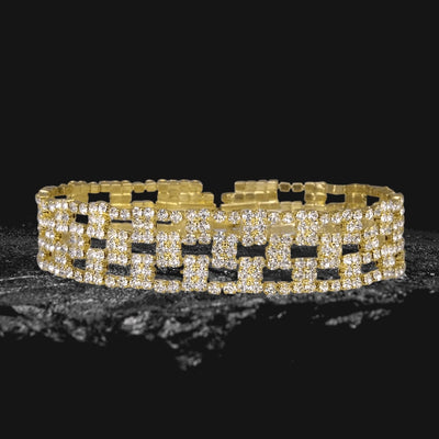 Las Vegas Bracelet crafted from white base metal with gold plating, featuring an intricate design encrusted with sparkling crystals, ideal for elegant female jewelry collections.