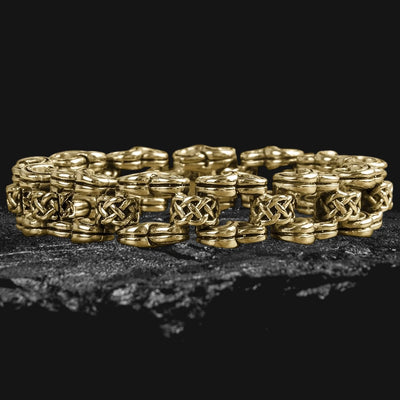 Men's Celtic Knot Gold Bracelet made of stainless steel with intricate Celtic knot design and gold plating, showcasing bold masculine jewelry craftsmanship.