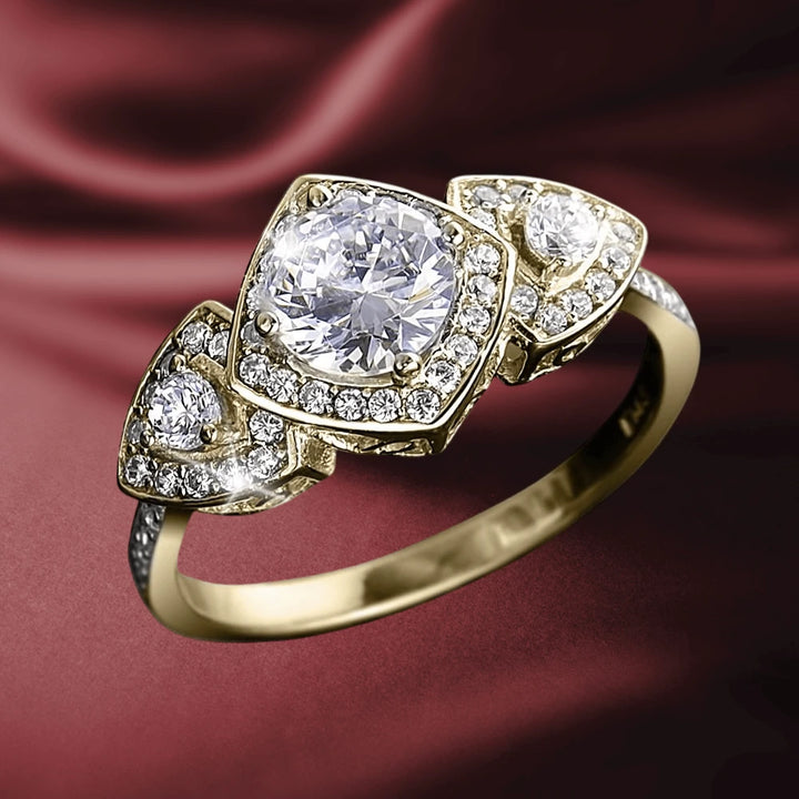 Samara Ring featuring a gold-plated sterling silver band adorned with a large central round crystal and smaller accent crystals, designed for female jewelry collectors.
