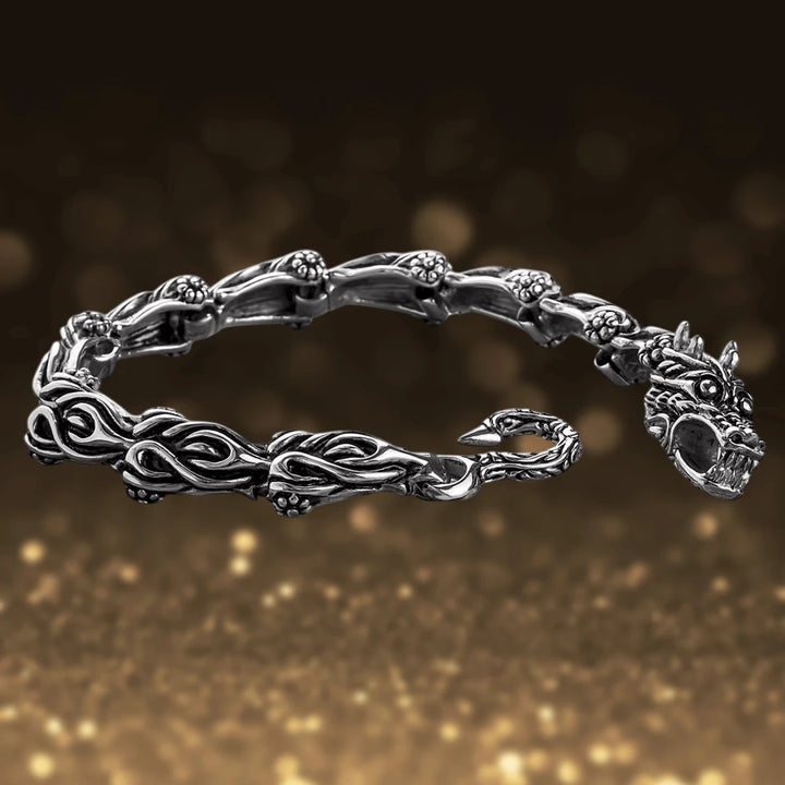 Dragons Lair Steel Bracelet in stainless steel for male, featuring an intricately designed dragon head clasp and detailed link pattern, a striking jewelry piece.