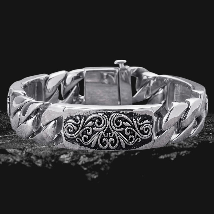 Montana Scroll Bracelet Steel made of stainless steel for men, featuring a bold, polished chain design with an intricate scroll pattern centerpiece.
