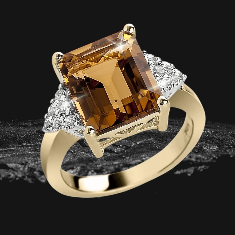 Honey Dew Ring featuring a large rectangular gemstone set in gold-plated sterling silver with intricate detailing, designed for women’s elegant jewelry collections.