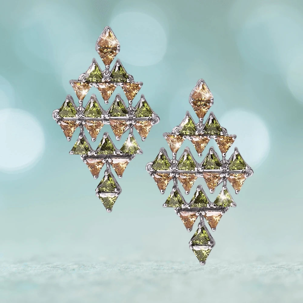 Raphaela Earrings featuring a geometric design with green and champagne stones set in sterling silver with rhodium plating, crafted for women’s jewelry collections.