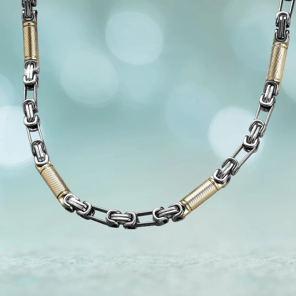 Barolo Steel Necklace featuring a two-tone stainless steel design with alternating gold and silver links, crafted for a bold and stylish male jewelry statement.