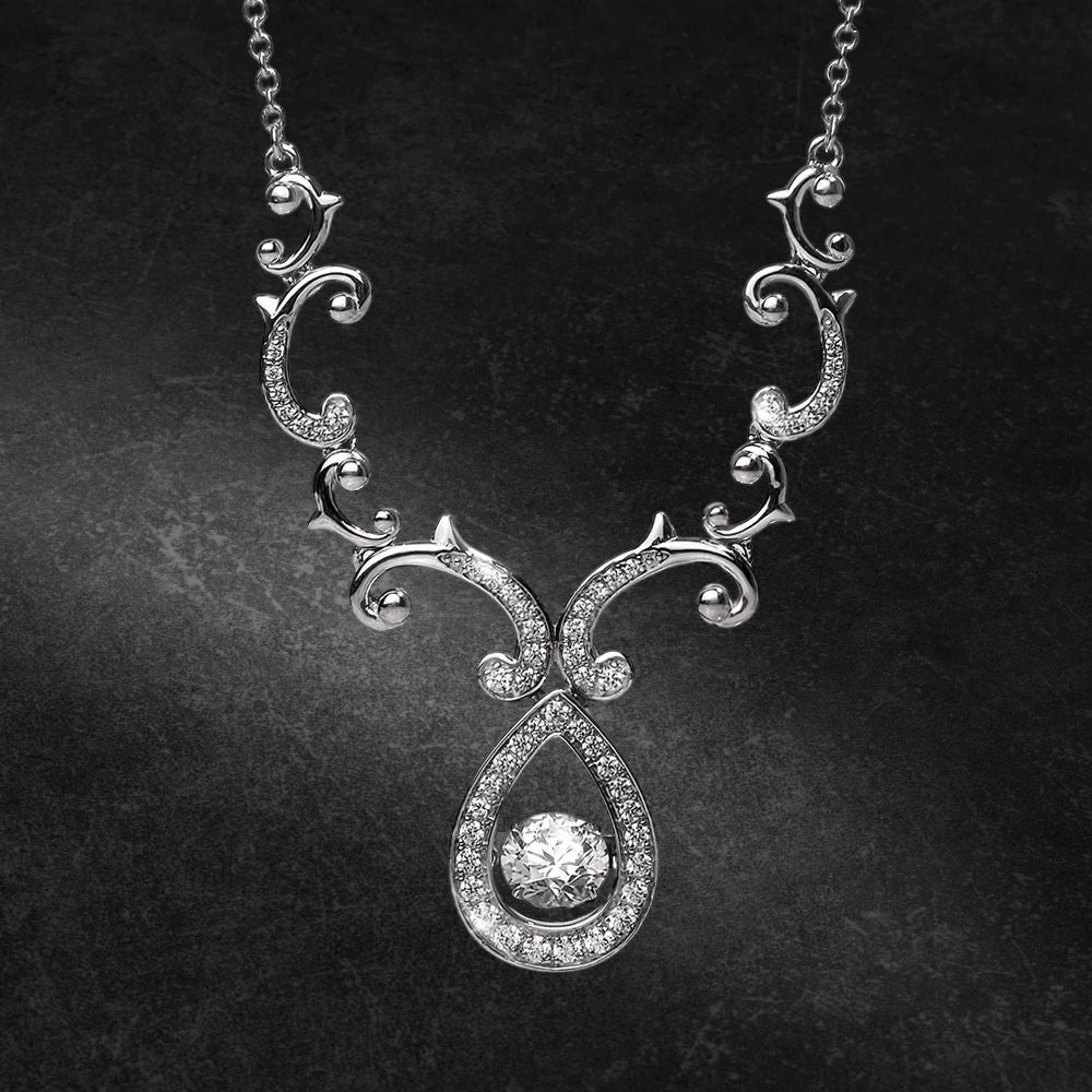 Rococo Dancing Necklace in sterling silver with rhodium plating, featuring intricate scrollwork and a central sparkling pendant, designed for females seeking elegant jewelry.