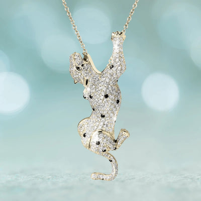 Bella 2-In-1 Pendant featuring a sterling silver and gold-plated design in the shape of a playful cat adorned with sparkling crystals, elegant jewelry for women.