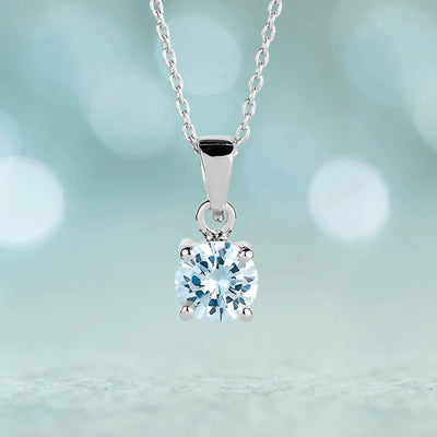 Brilliant Birthstones Pendant March featuring a sterling silver rhodium-plated chain with a sparkling light blue gemstone, elegantly designed for women’s jewelry collections.