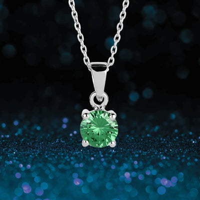 Brilliant Birthstones Pendant May featuring a rhodium-plated sterling silver chain with a vibrant green gemstone pendant designed for women’s jewelry collections.