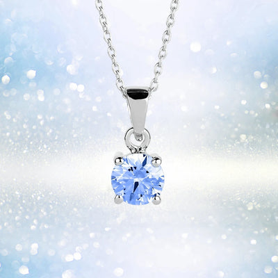 Brilliant Birthstones Pendant December features a sparkling blue gemstone set in sterling silver with rhodium plating, designed elegantly for women’s jewelry collections.