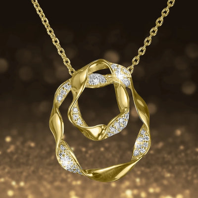 Ribbon Pendant featuring a gold-plated sterling silver design with sparkling accents on an elegant chain, perfect jewelry for women.