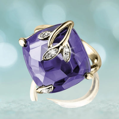 Harmony Floral Ring featuring a large purple gemstone set in sterling silver with gold plating, accented by delicate leaf-shaped details for a feminine touch.