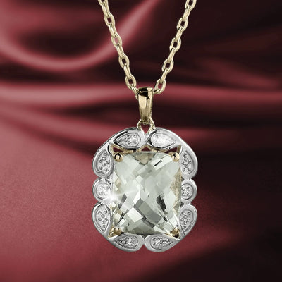Enchanted Amethyst Pendant featuring a large faceted amethyst set in sterling silver with gold plating, designed for women, displayed on a delicate gold chain against a rich burgundy background.