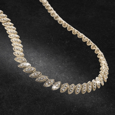 Elegant Captivating Leaf Necklace for female, featuring gold plating and a detailed leaf-inspired design with sparkling accents, perfect for refined jewelry collections.