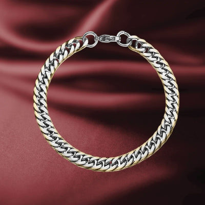 Double Curb Gold Edged Bracelet for men, crafted from stainless steel with a sleek gold edge design, resting on a rich burgundy fabric background.