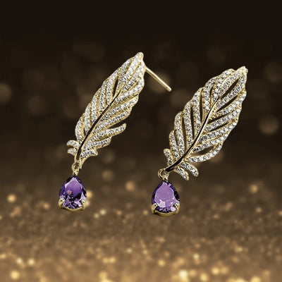 Orelia Amethyst Earrings featuring sterling silver with rhodium plating, designed for women, showcasing leaf-shaped studs adorned with sparkling accents and teardrop amethyst gemstones.