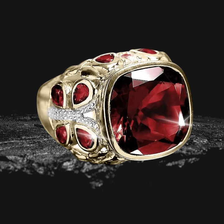 Springtime Garnet Ring for female, featuring a large deep red garnet stone set in gold-plated stainless steel with intricate detailing and smaller red stones.
