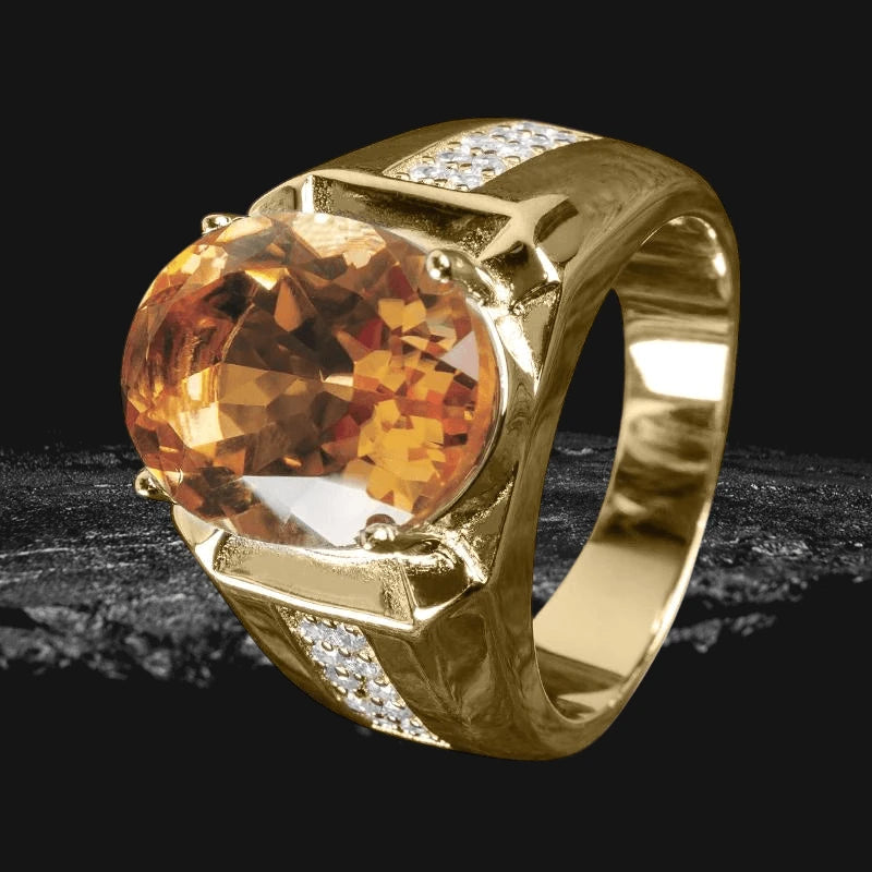 Riotous Rush Ring featuring a large faceted amber stone set in polished sterling silver with small accent stones, designed for men’s jewelry.
