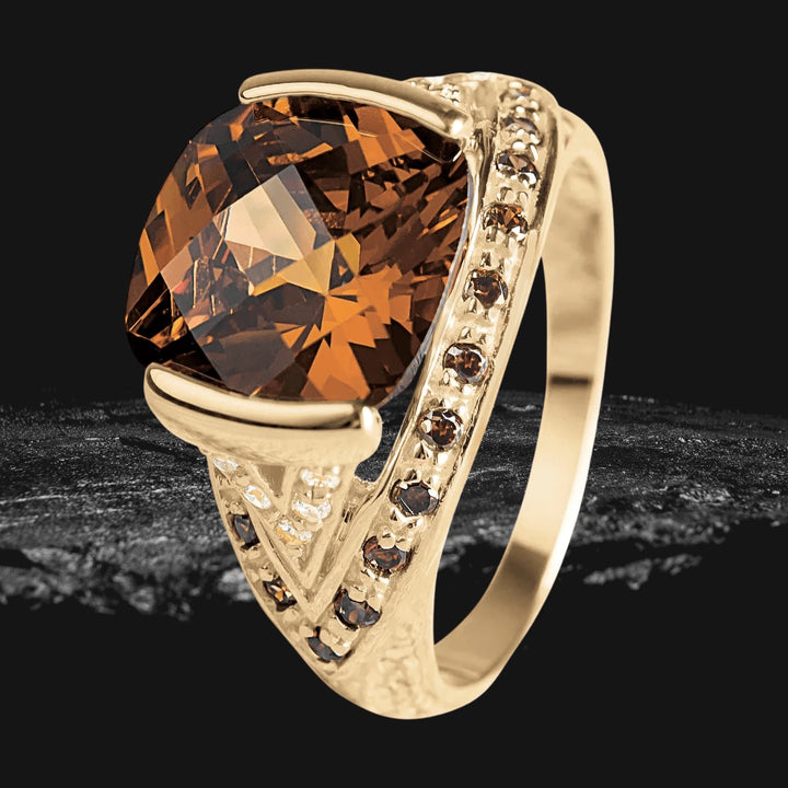 Sienna Coffee Ring featuring a large brown gemstone set in sterling silver with gold plating, designed for women, accented with smaller matching stones along the band.