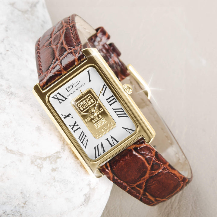 Gold Ingot Men's Watch with a gold-plated stainless steel rectangular case, white dial featuring Roman numerals, and a textured brown leather strap.